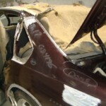 Before and after photographs of a damaged Chevy Impala that was repaired by Elite Paint & Body Shop in West Palm Beach, Florida.